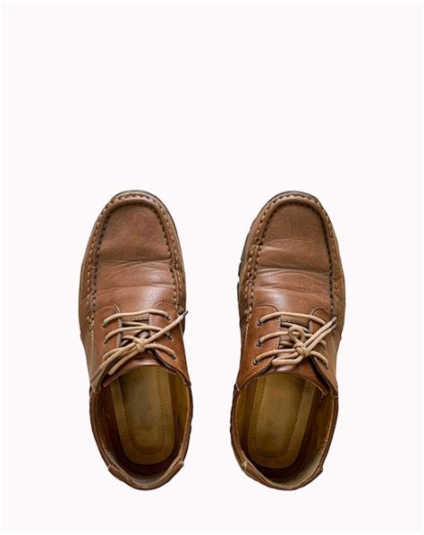 Premium Photo | Old brown leather shoes isolated