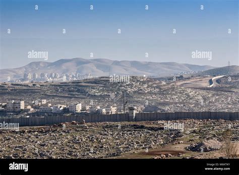 Jerusalem, Palestine, January 12, 2011: A concrete wall built by Israel ...