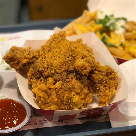 Kfc S Pore Goldspice Chicken Coated With Salted Egg And Curry Leaves