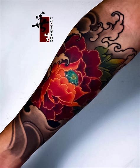 Japanese Ink on Instagram: "Yet another vibrant Japanese arm tattoo by ...