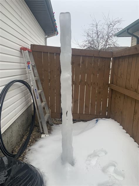 This large ice pillar in our back yard : r/mildlyinteresting