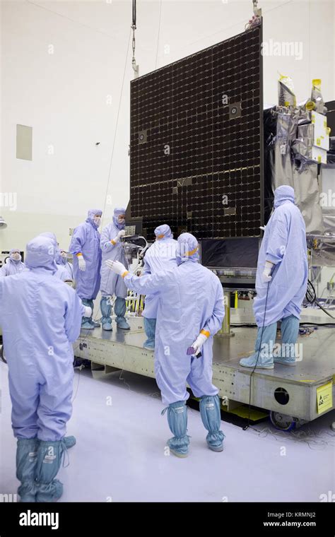 Solar Array Y Panel Being Installed Onto The OSIRIS REx Spacecraft At