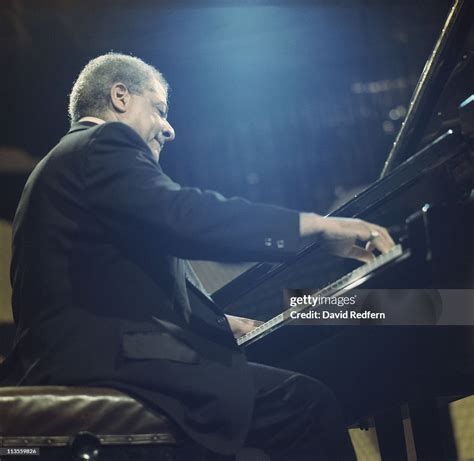 Teddy Wilson Us Jazz Pianist Playing The Piano During A Live