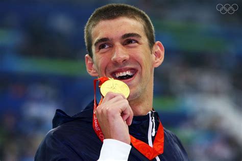 BEIJING - AUGUST 10: Michael Phelps of the United States poses with the ...