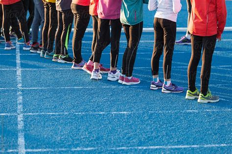 "Group Of Children In A Running Training" by Stocksy Contributor "VICTOR TORRES" - Stocksy