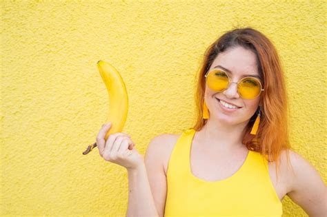 Premium Photo Portrait Of A Beautiful Redhaired Woman In Sunglasses