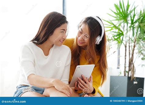 Young Cute Asia Lesbian Couple Using Tablet With Happiness Lgbt Stock Image Image Of Digital