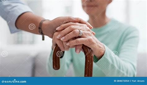 Senior Woman Walking Cane And Holding Hands Of Nurse With Healthcare