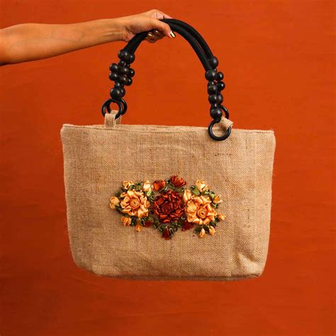 Ribbon Embroidered Jute Bag Who We Are