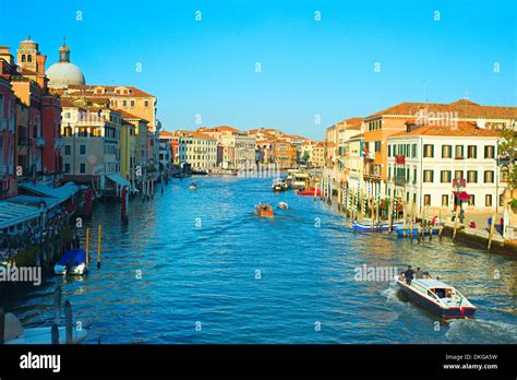 Tourists and locals chilling in cafe and touring Venice streets on ...