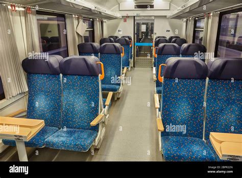 Interior Of A Passenger Train With Empty Seats Stock Photo Alamy