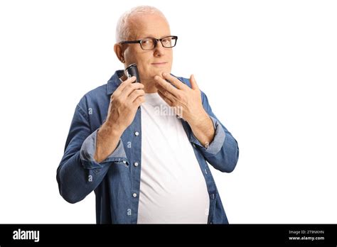 Mature Man Using A Shaving Machine Isolated On White Background Stock Photo Alamy