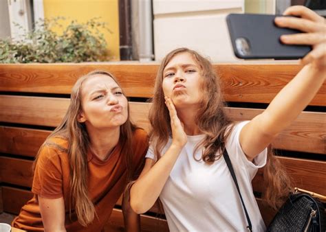 Free Photo Cute Best Friends Taking A Selfie