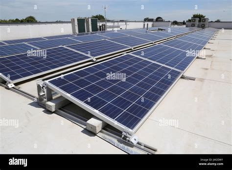 PV Solar Panels On The Flat Roof Of A New Primary School In Essex UK