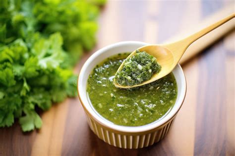 Salsa Verde In A Ceramic Dipper With A Spoon Stock Image Image Of