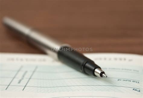 Writing a cheque Royalty Free Stock Image | Unlimphotos - Royalty Free Stock Photos