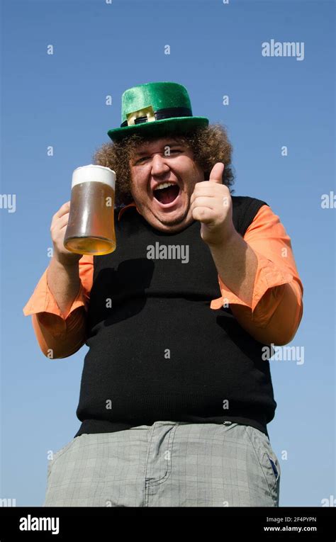 Funny Fat Guy Is Drinking Beer Stock Photo Alamy