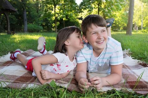 Premium Photo | Happy smiling children playing outdoors in spring park