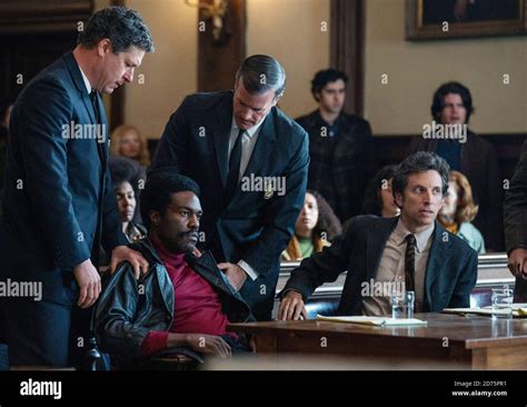 THE TRIAL OF THE CHICAGO 7, seated at left: Yahya Abdul-Mateen II as ...