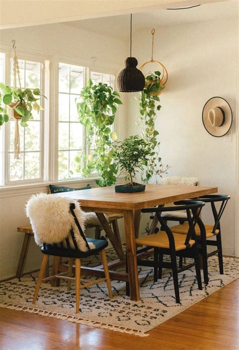 Boho Dining Room With Eclectic Pink Gallery Wall