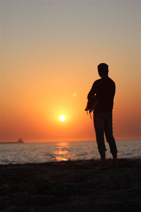 People on Beach During Sunset · Free Stock Photo