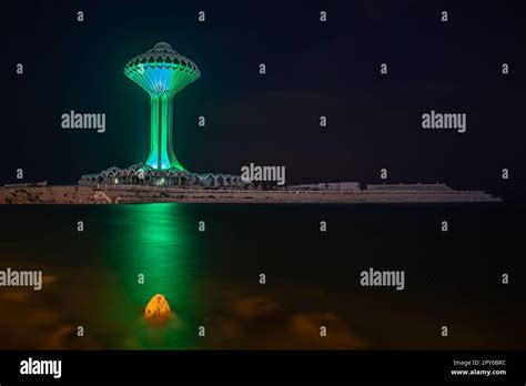 Al Khobar Water Tower Illuminated In Green During The Night On The Sea