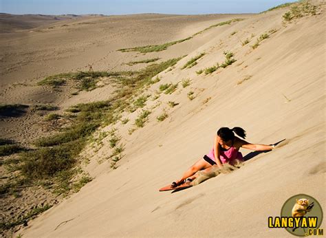 Sandboarding at the Ilocos Norte Sand Dunes • langyaw