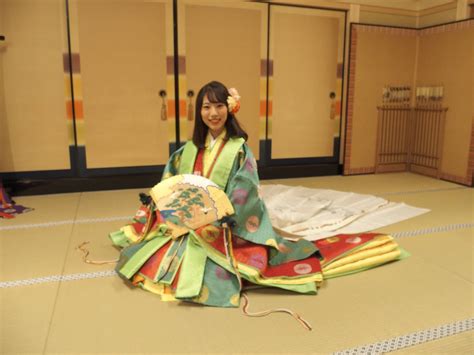 A Woman Dressed In Junihitoe At A Kimono Photography Experience