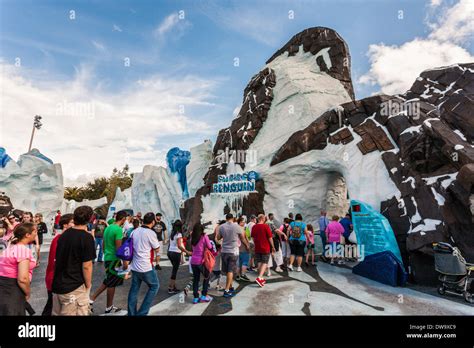 Park guests entering Empire of the Penguin attraction in Antarctica