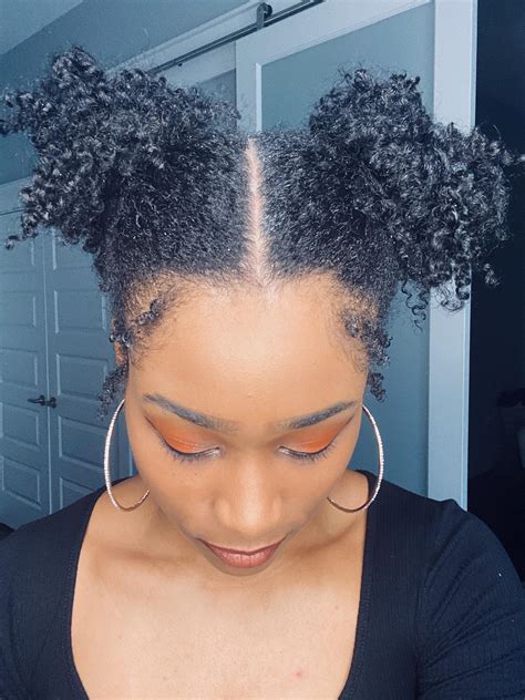 Tried a new style today. Curly buns. : r/Naturalhair