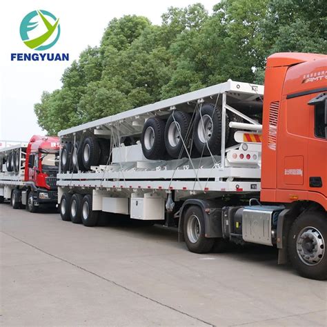 Fengyuan Design Axle Flatbed Semi Truck Trailer To Uganda China