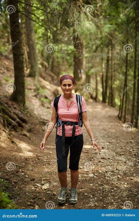 Woman hiker in the woods stock image. Image of caucasian - 60093223