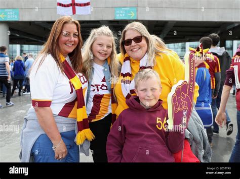 Bradford City fans outside the ground before the game Stock Photo - Alamy