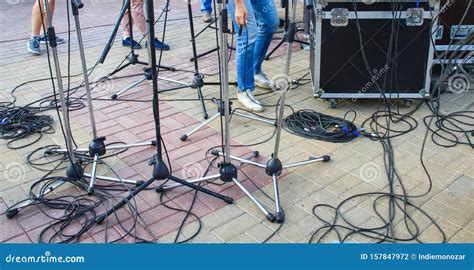 Close Up View Of Tangled Black Wires And Cables Plugged And Microphone