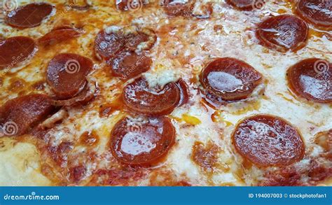 Greasy Hot Pepperoni And Cheese Pizza Slices Stock Image Image Of