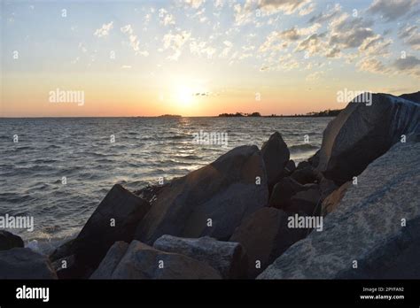 Large Boulders Line The Shore At A Sandy Hook New Jersey Bayside