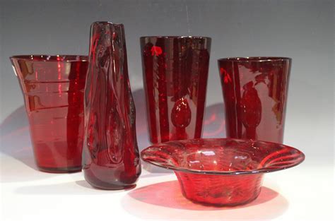 Five Pieces Of Whitefriars Ruby Glass Including A Wave Ribbed Tumbler Vase Height 205cm And A Ri