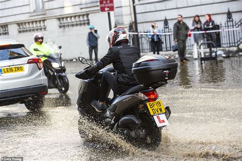 Flooding Causes Delays On Tube And Roads Are Left Underwater In London