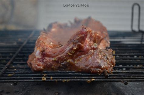 Two Pieces Of Meat Cooking On A Grill With The Words Lemonyllmon Above It