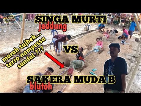 SINGA MURTI VS SAKERA MUDA B GRUP KALAH TARIK TAMBANG DI LAPANGAN