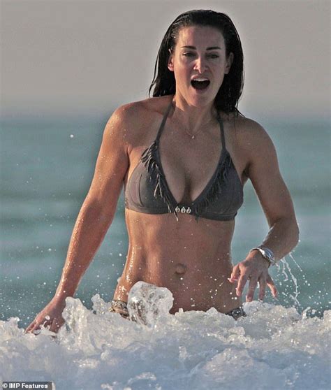 Kirsty Gallacher Shows Off Her Toned Abs In Tiny Brown Bikini