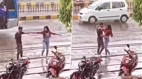 Indore Couple Dance In Rain Viral Video Unfazed By Traffic Young Man