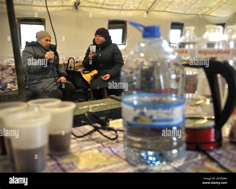 LADYZHYN UKRAINE NOVEMBER Women Have Hot Drinks At A Point Of Invincibility As A