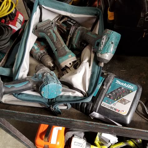 MAKITA CORDLESS TOOL SET, 2 DRILLS, ANGLE GRINDER, AND IMPACT GUN W ...