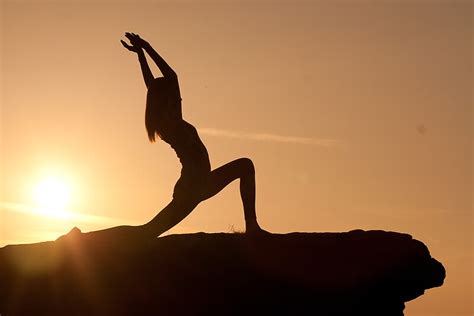 "Yoga Poses at Sunset 1" by JonWHowson | Redbubble