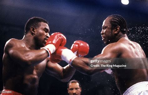 Michael Dokes lands a punch against Evander Holyfield during the ...