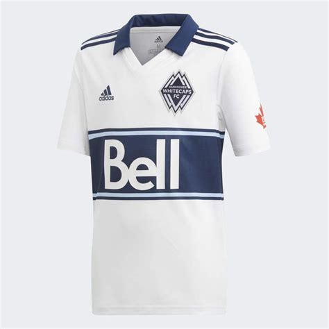 The Vancouver Whitecaps Adidas Home Jersey Is Shown In White And Navy Blue