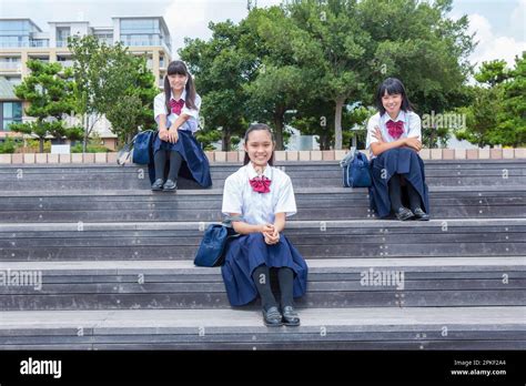 Junior High School Students Sitting On The Stairs Stock Photo Alamy