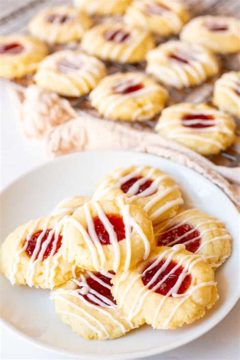 Shortbread Thumbprint Cookies With Cherry Jam And Icing Baker Bettie