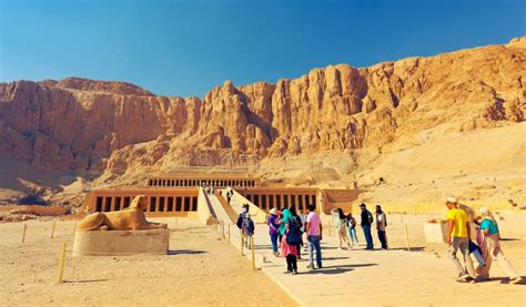 Group Of Tourists Are Going To The Balustrade To The Mortuary Temple Of